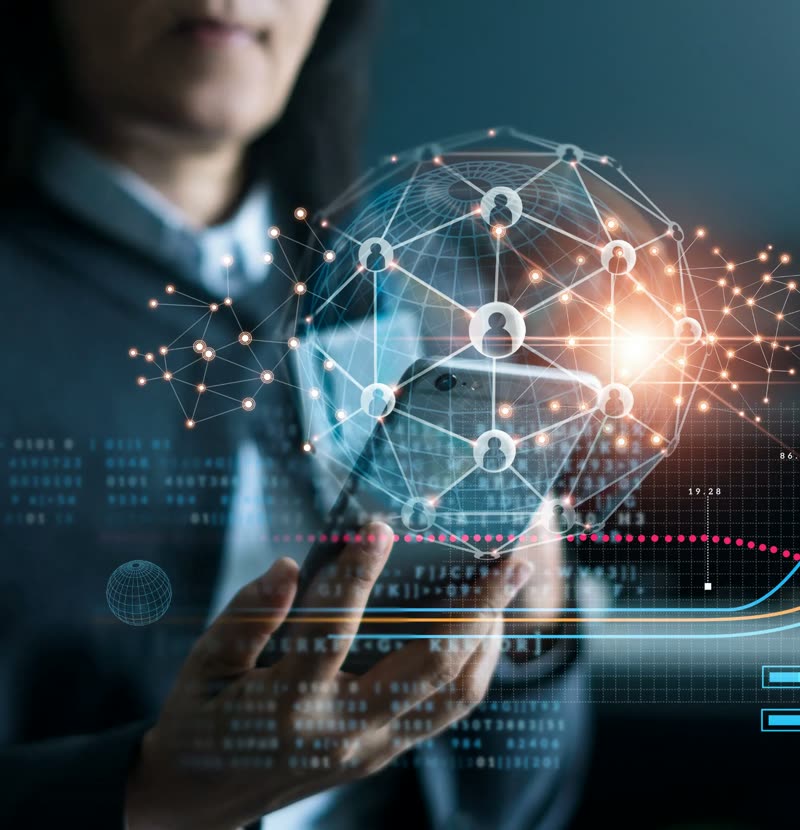Woman holding a phone with a glowing global network sphere above it